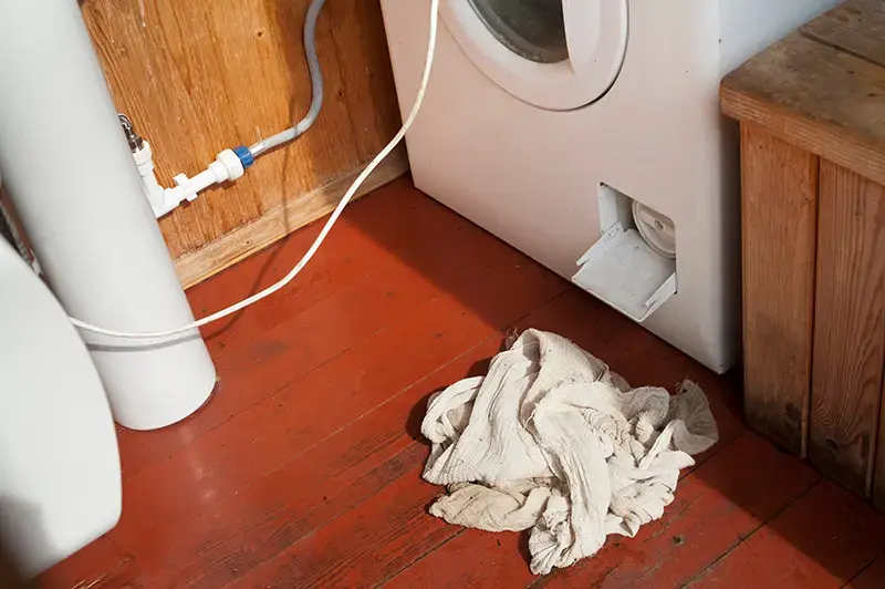 Washing machine with filter drawer open